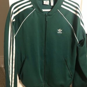 Adidas women’s green zip up track suit. Medium